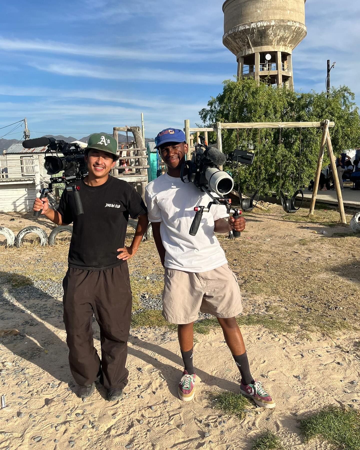 Cameras in hand,
Chasing light on distant sands,
Stories in the sky. @sonycine