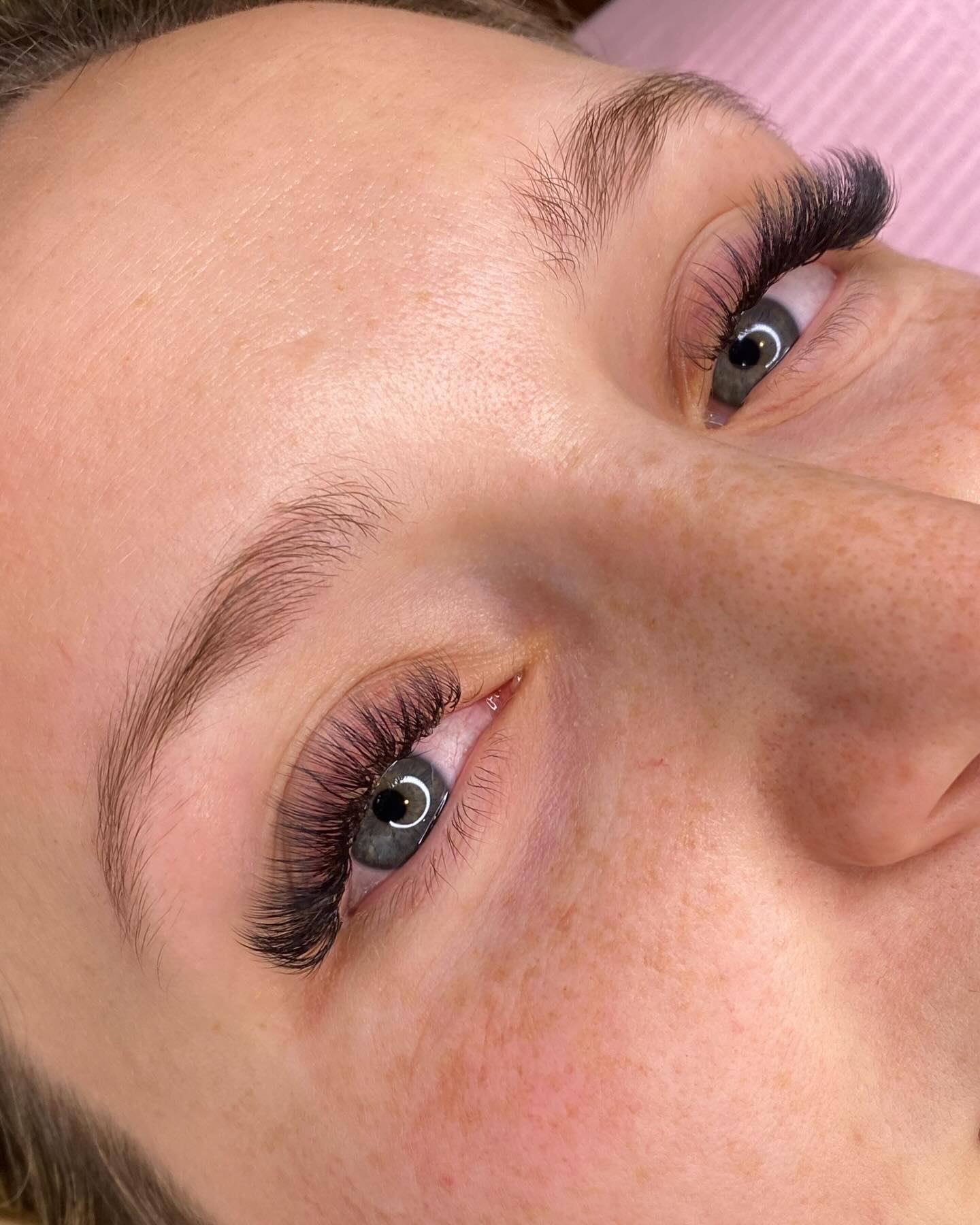 Have you ever thought about lashes for your big day? This stunning bride is just three weeks away from tying the knot! I always suggest a trial run for lash extensions, especially if you're new to them. We opted for a light, wispy volume look. She's booked a fill in three weeks for a touch-up before the wedding! All our sets are customizable - we can adjust length, fullness or even go for a shorter lash. Wedding season is here, and I have to say, lashing up a bride is my favorite!!