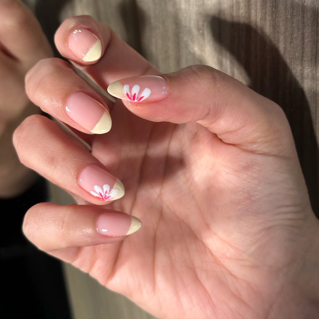 Butter yellow french with nail art - Evora Lounge