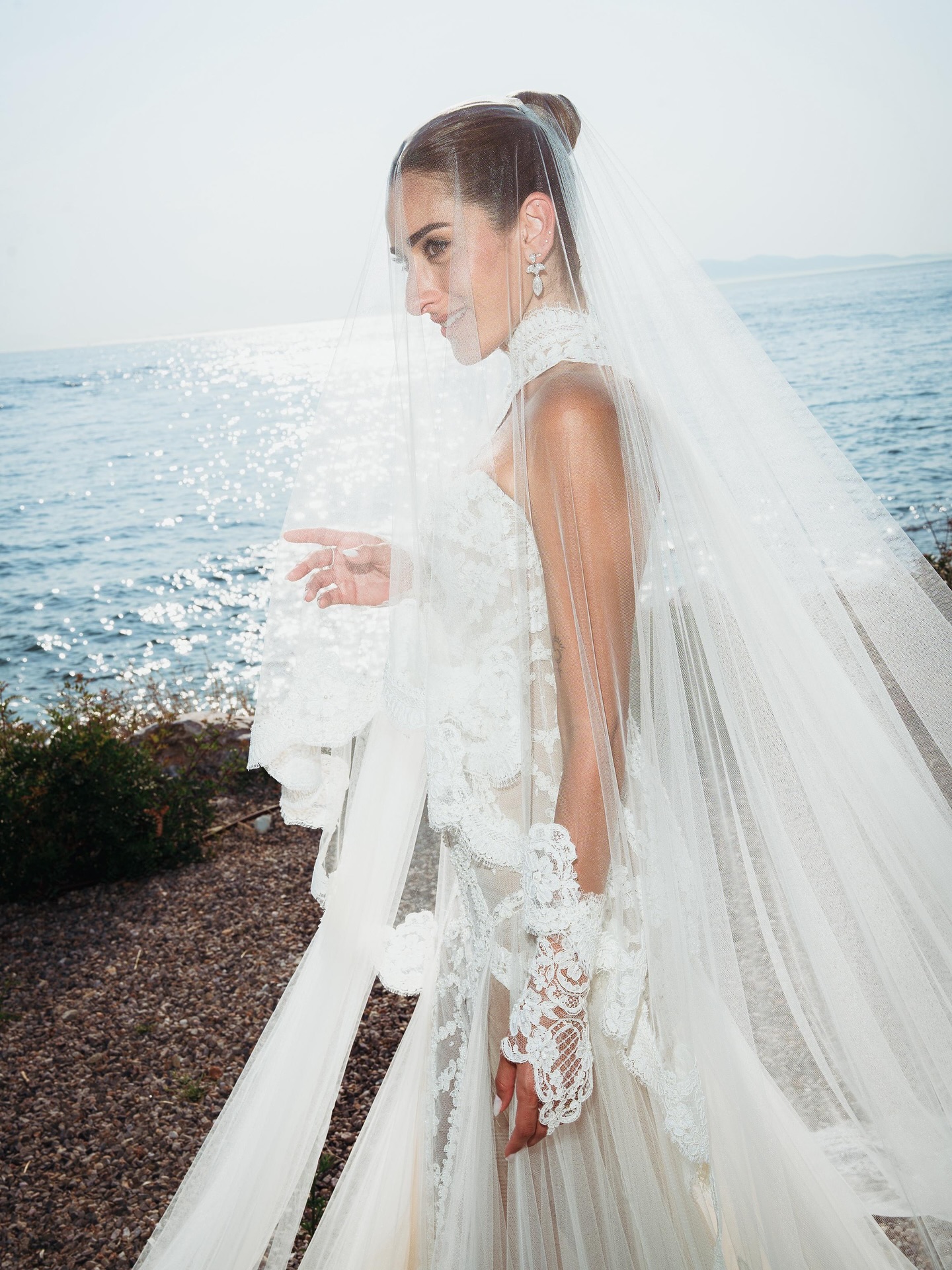 In a sun-drenched corner of Athens, #AminaKhalil celebrates love once more, this time in the quiet company of family. For her second, more intimate wedding, the Egyptian actress wears another bespoke creation by Maison Yeya: a whisper of lace, airy and understated, and a vision of elegance. Captured exclusively for Vogue Arabia, the second ceremony is softer sequel to a fairytale, one that’s equally as unforgettable.
Photography: @lamismagdy
Stylist: @mohamedashraff
Makeup: @Itsnohathemua
Hair: @kimisafadi
Location: @ooaesthesis
#VogueArabia #AminaKhalil