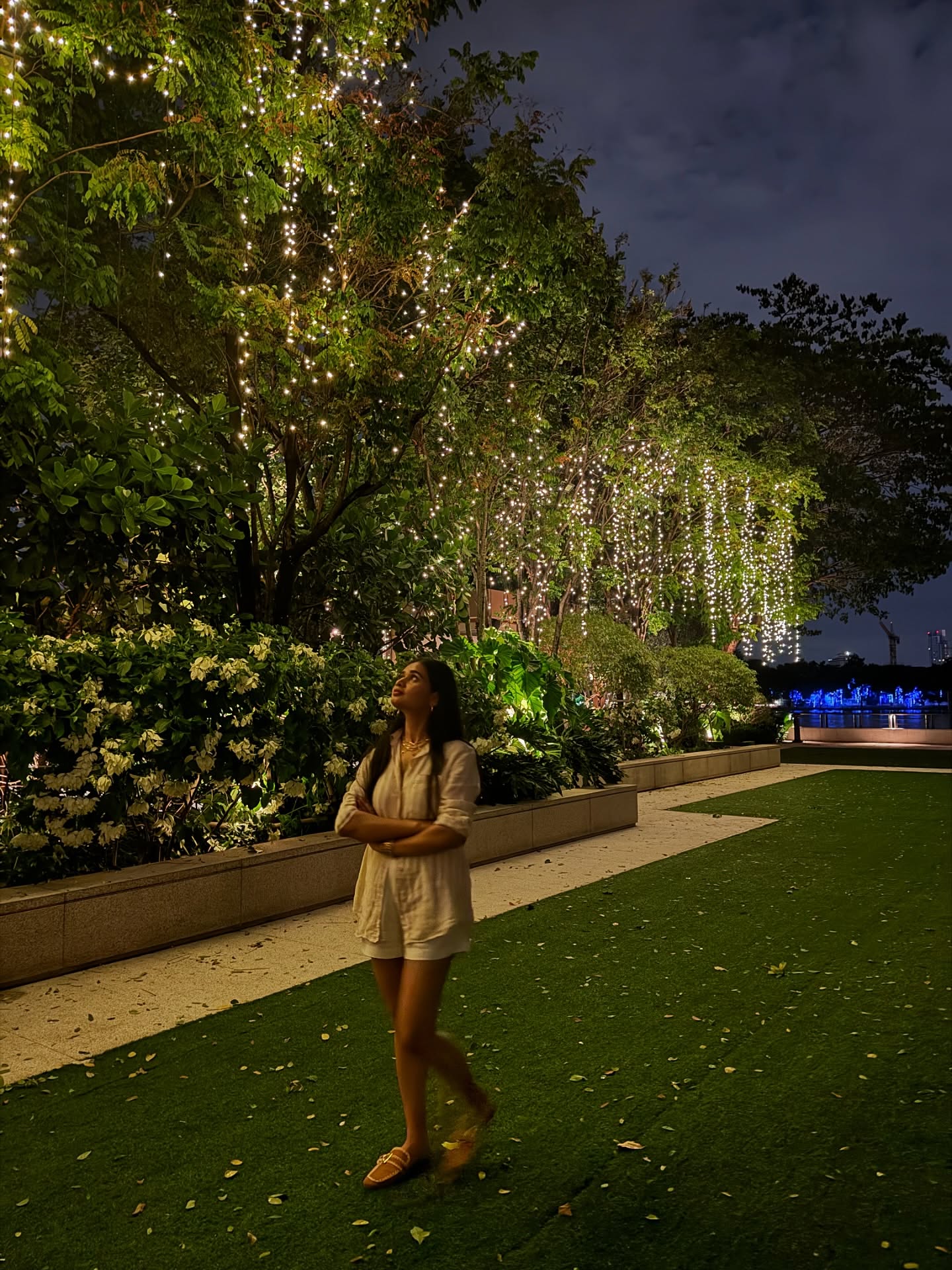 She walked like a daydream beneath a sky stitched with light 🌌🌙 #nightwalk
.
.
#nightvibes #thailand