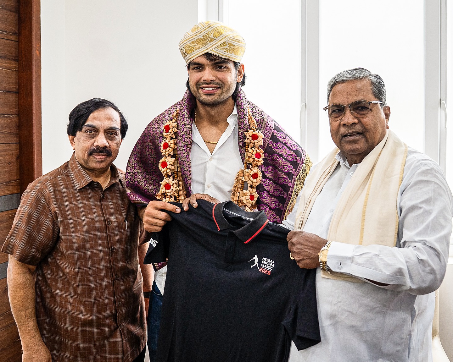 Double Olympic champion and Founder of NC Classic, Neeraj Chopra met Hon’ble Chief Minister of Karnataka Shri Siddaramaiah at his residence earlier today.
Neeraj thanked Shri Siddaramaiah for all the support extended, as the Chief Minister accepted his invite to the inaugural edition of the NC Classic, which is scheduled to take place at the Sree Kanteerava Stadium, in Bengaluru, on Saturday, 5th July.
#NeerajChopraClassic #javelin #GameOfThrows #ChiefMinister #siddaramaiah
