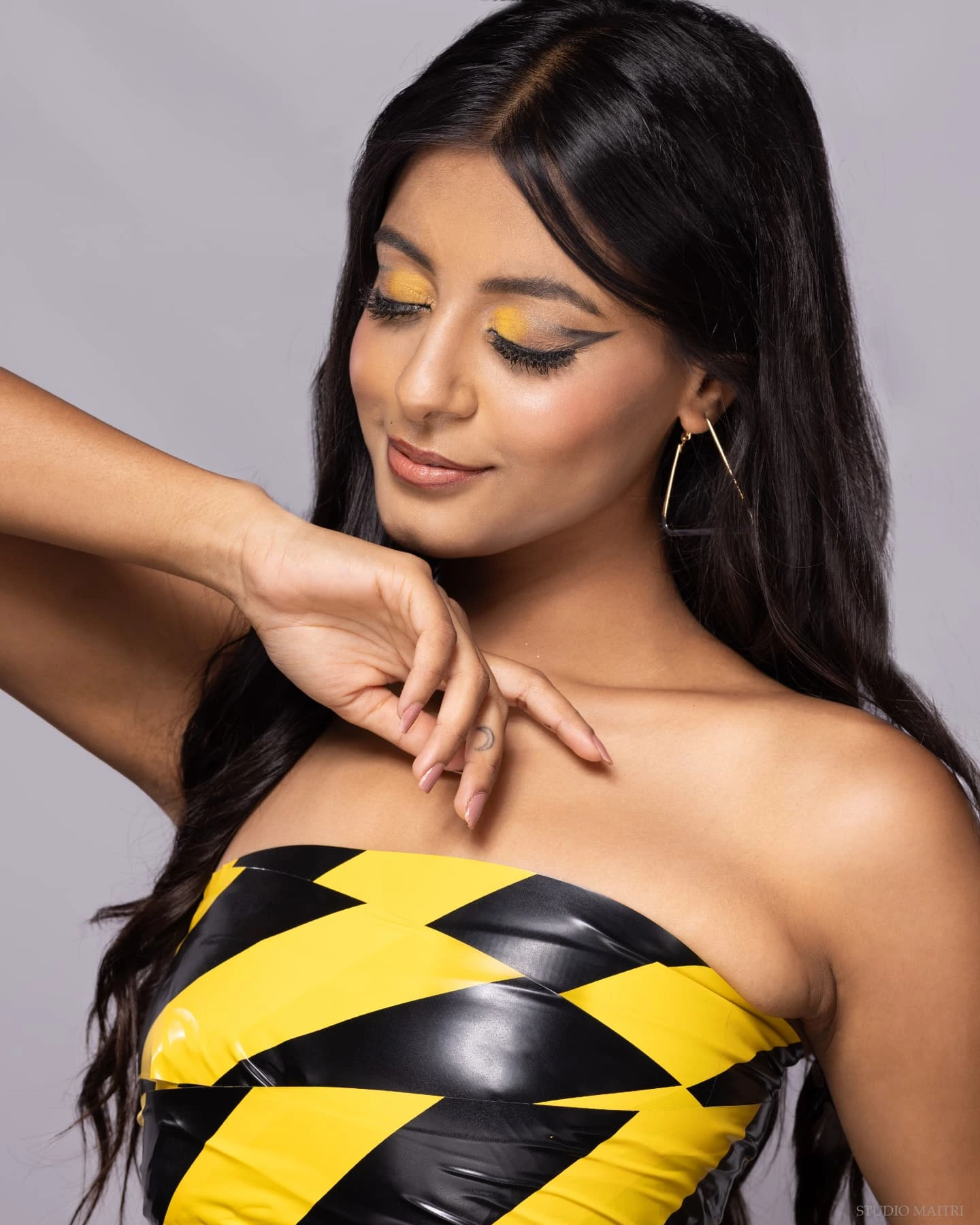Warning signs never looked this pretty.⚠️🌟
.
Shot by - @studiomaitri.portraits
MUA - @shobhabg_makeover 🫶
Hair artist - @sandhyamakeover111 💛
.
.
.
#caution⚠️ #cautiontape #tapedress #photoshoot #conceptualshoot #yellowblack