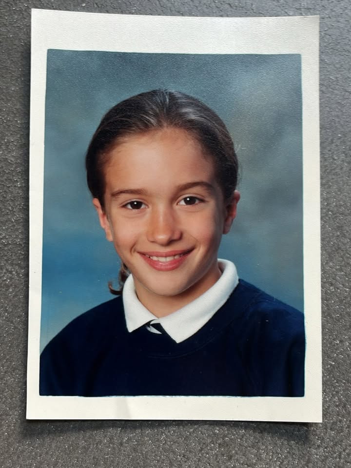 Tomorrow morning I am launching something I’ve been working on for over 2 years now. It’s something that I deeply care about and I think it’s deeply rooted in my childhood experience. The little boy in this photo was living in a home with 2 parents struggling with their mental health. My Dad was a heroin addict in and out of rehab and relapses while my Mum was battling with extreme OCD with cleaning, anxiety, panic attacks and an eating disorder. Home life was unstable, unpredictable, chaotic and stressful for me and my brother Nikki.
These were all things I didn’t really understand at the time but I do remember a feeling inside of being scared to talk to anyone about it because I feared I would be taken away from them if people knew how we were living.
Thank God I found my therapy in those early years through movement and exercise at primary school. I’ve always said PE and exercise saved my life and took me down a totally different path to what it could have been. I realised at about 4 years old that when I exercised or played sport I could physically remove stress and anxiety from my body. I could forget about the madness from the night before or the worry of everything changing in a moment and so exercise became my best friend that no one could take away from me.
I know many children today are not moving enough, or sedentary and living with parents who may struggle with their own mental health too. This is the reason I’m so focussed on helping young people move their bodies and feel the same way I do about exercise. If I can teach a child to connect the dots with exercise and their mind I believe it can change their life forever.
What I’ve been working on is going to help more kids, move more, more often and I’m so excited to share it with you. Check back on here tomorrow morning at 7am to see what it is. Do you have any ideas what it might be? 😀
