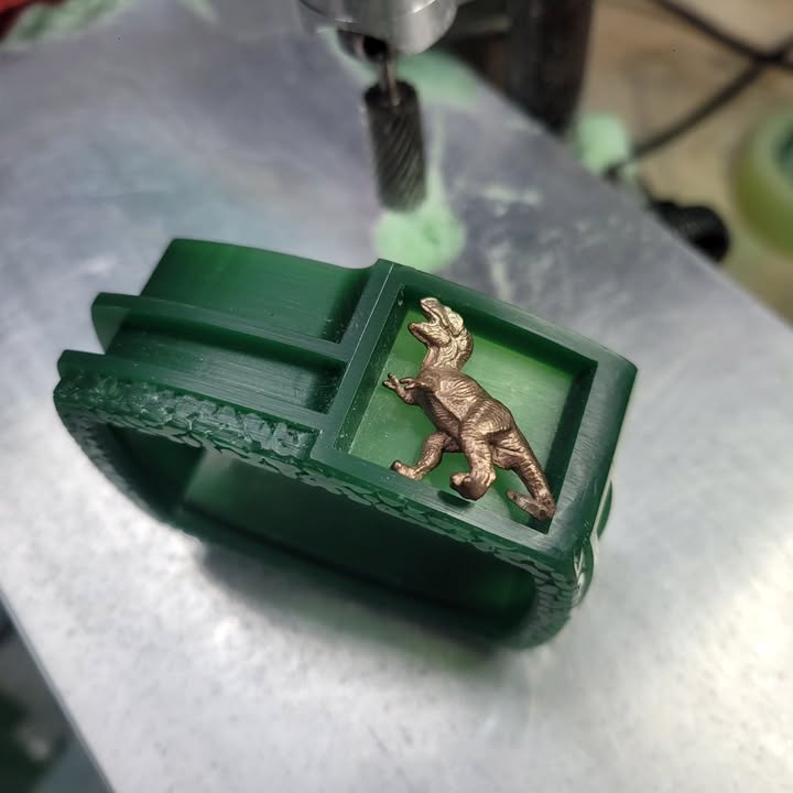 Dinosaur bone inlay cuff in the works. Just need to carve the comet and find a small piece of meteorite for the inlay, detail the top half, cast the parts in sterling silver and shibuichi, clean everything up, solder it all together, and cut and inlay the bone and meteorite. No problem 👍🤔🤦♂️🤷♂️🤣
#silver #silversmithing #silverjewelry #sterlingsilver #silverbracelet #cuff #cuffbracelet #inlay #redcoral #dinosaur #dinobone #handmade #lostwaxcasting #casting #etsy #wrightsvillebeach #wilmington #northcarolina #shibuichi #meteorite #handcut #handcarved #handcrafted #carving #jewelry